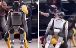 Cardi B sufre caída al intentar bailarle a un robot en la calle | VIDEO